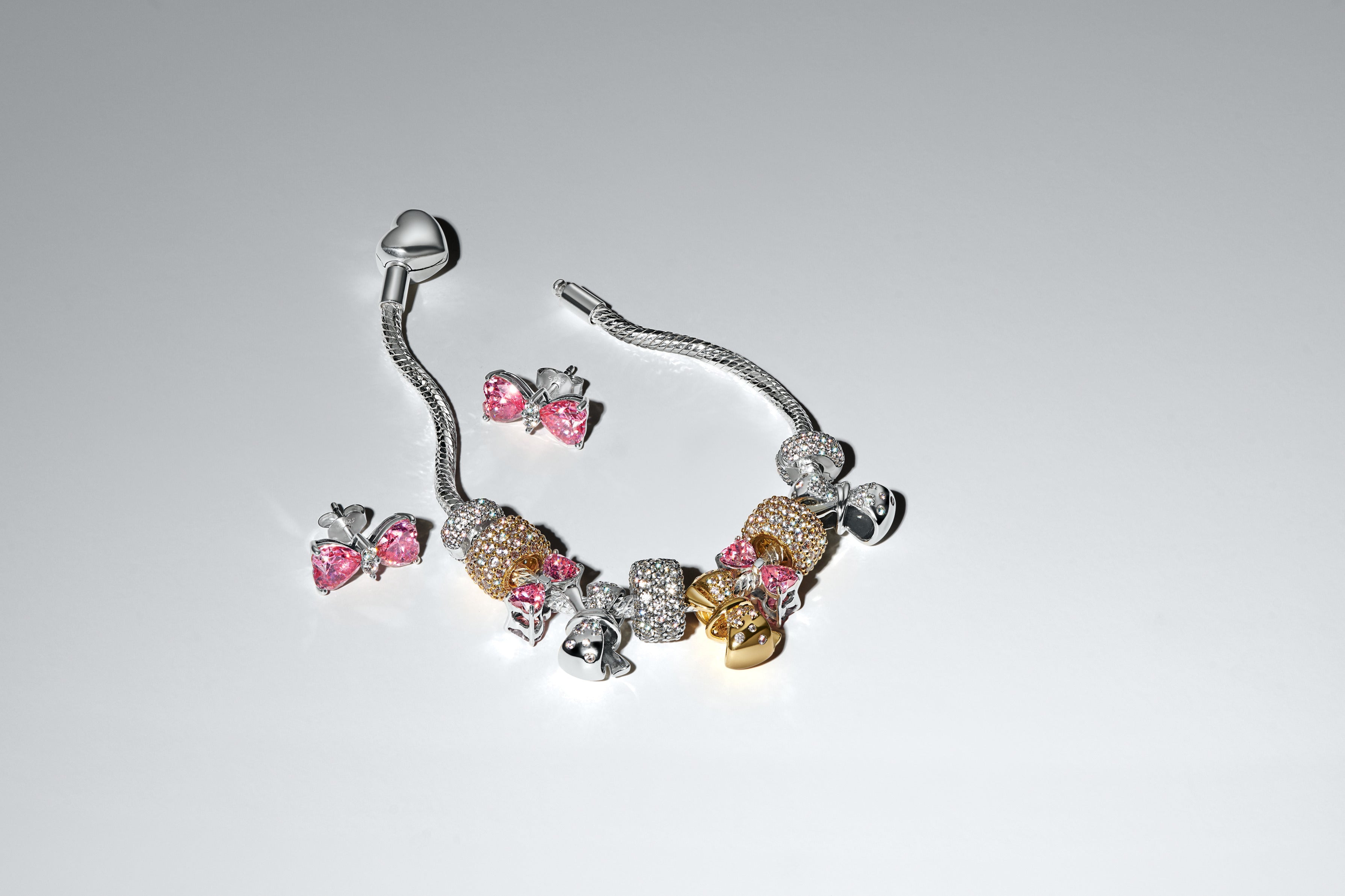 Bow Sterling Silver Charm With Fancy Pink Cubic Zirconia