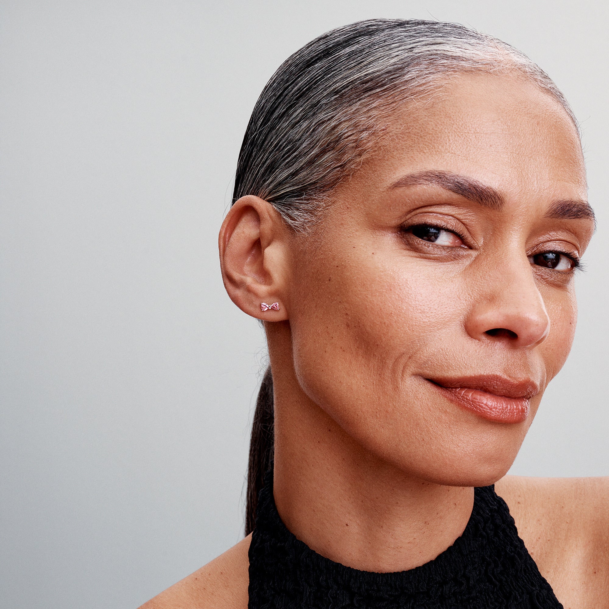 Bow Sterling Silver Stud Earrings With Fancy Pink Cubic Zirconia