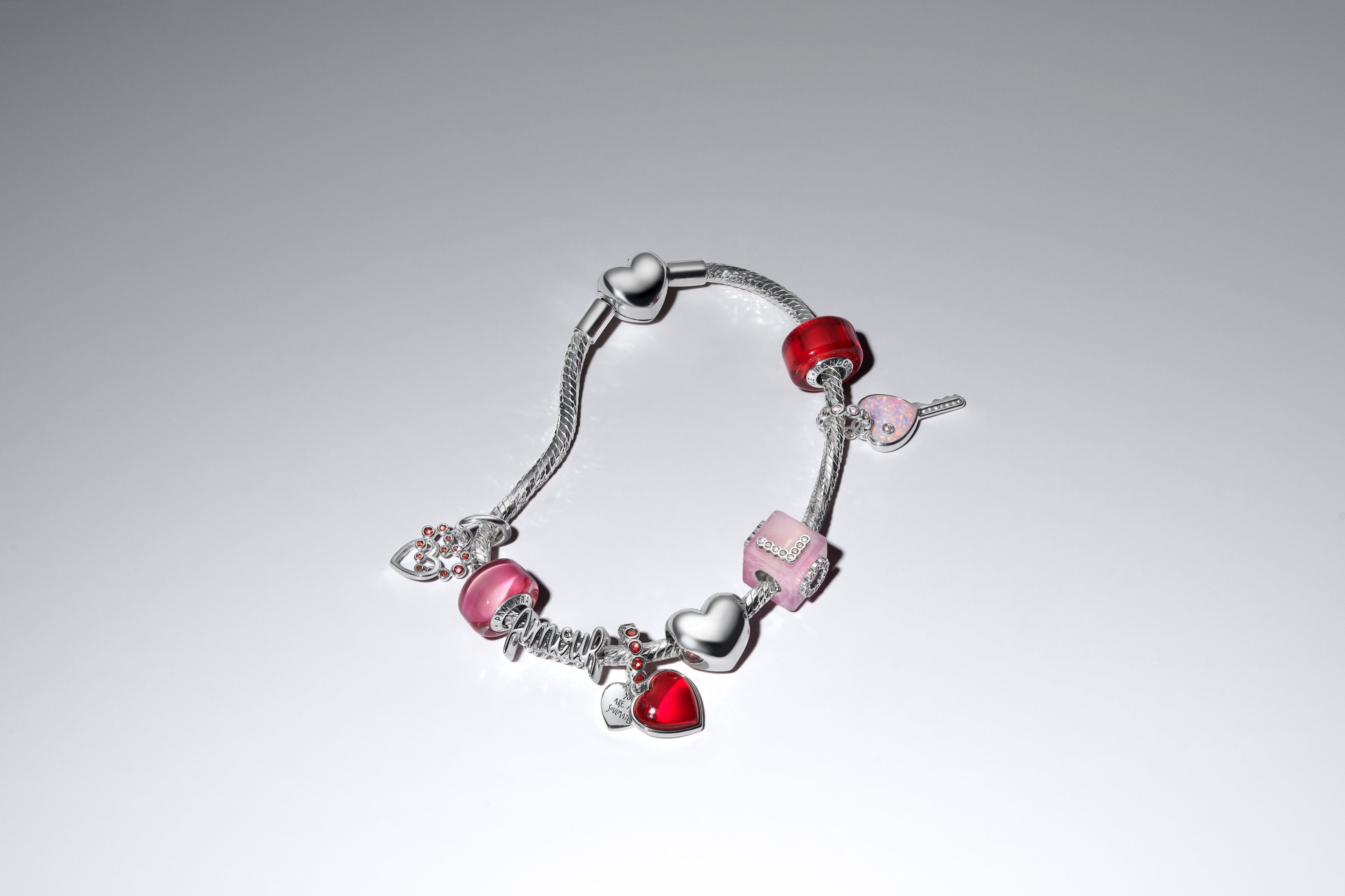 Connected Hearts Sterling Silver Dangle With Salsa Red Crystal