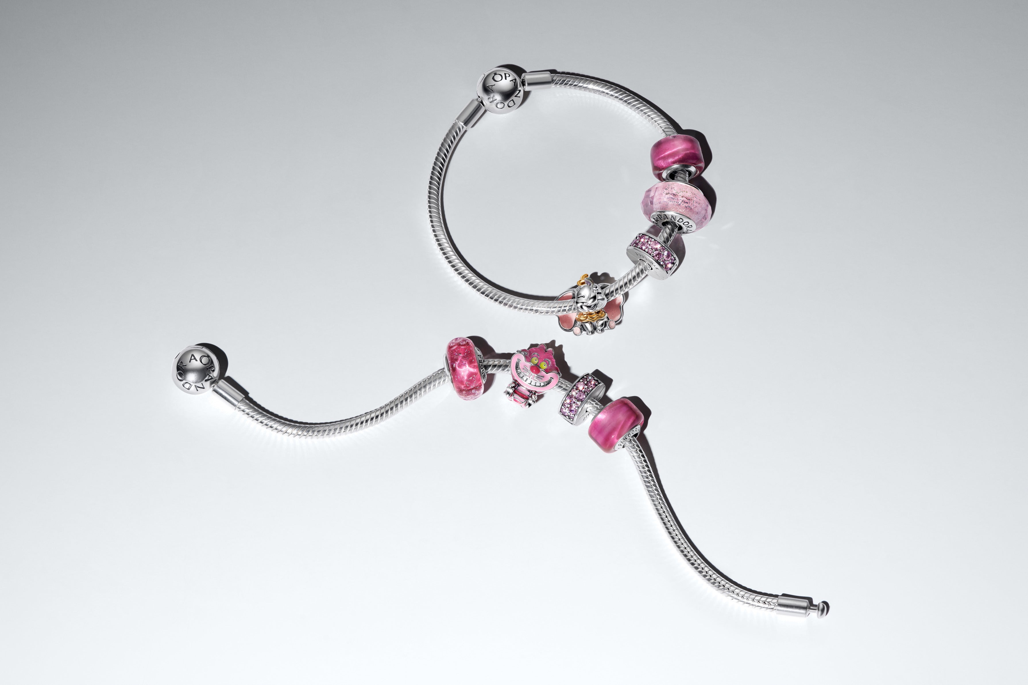 Disney Cheshire Cat Sterling Silver Charm With Glittery Pink, Light Pink, Pink And Glow In The Dark Yellow Enamel