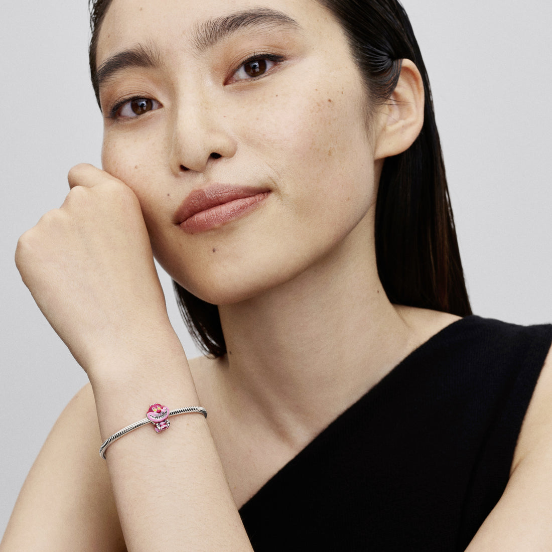 Disney Cheshire Cat Sterling Silver Charm With Glittery Pink, Light Pink, Pink And Glow In The Dark Yellow Enamel