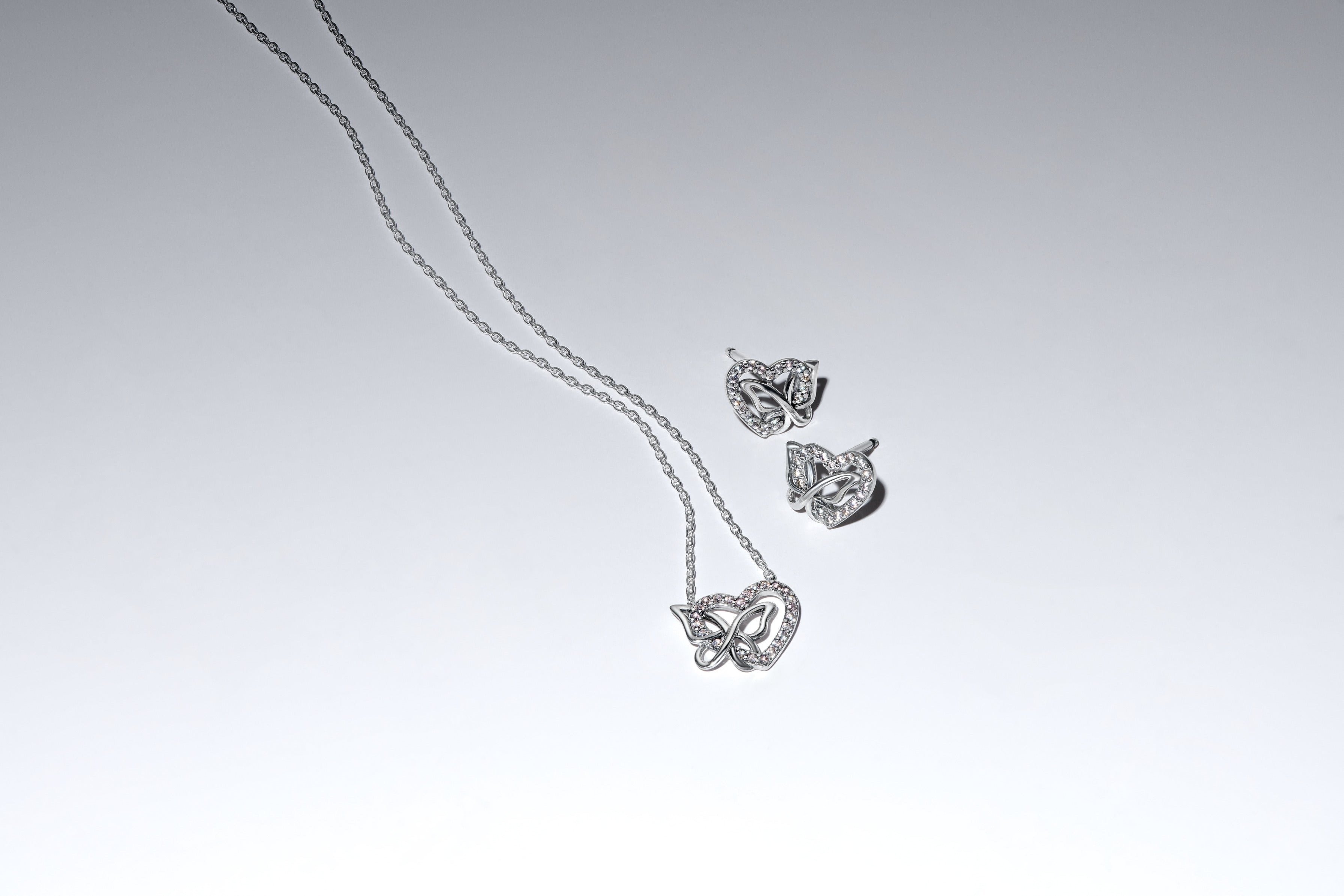 Heart And Butterfly Sterling Silver Stud Earrings With Clear Cubic Zirconia