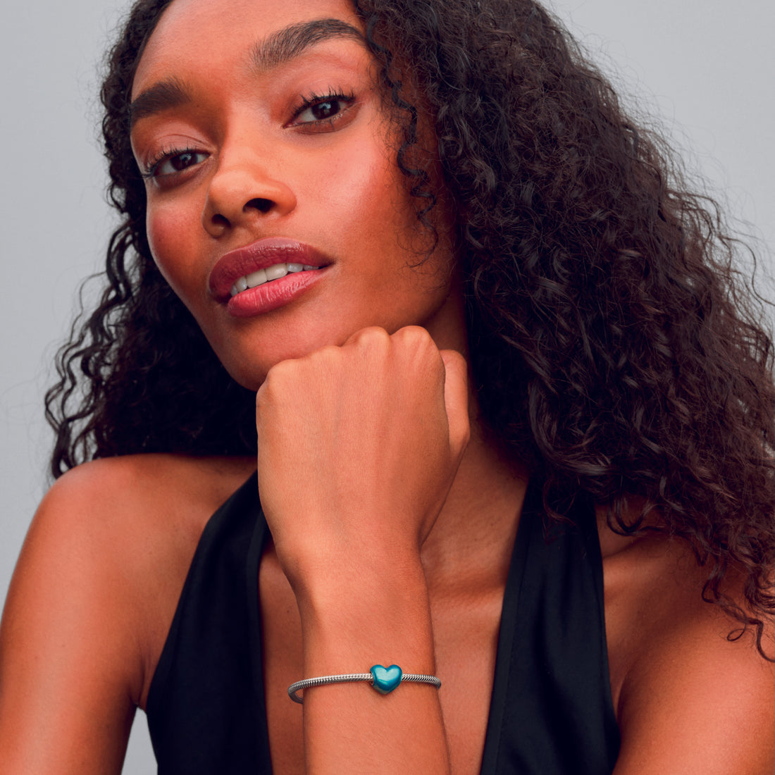 Heart sterling silver charm with transparent light blue enamel