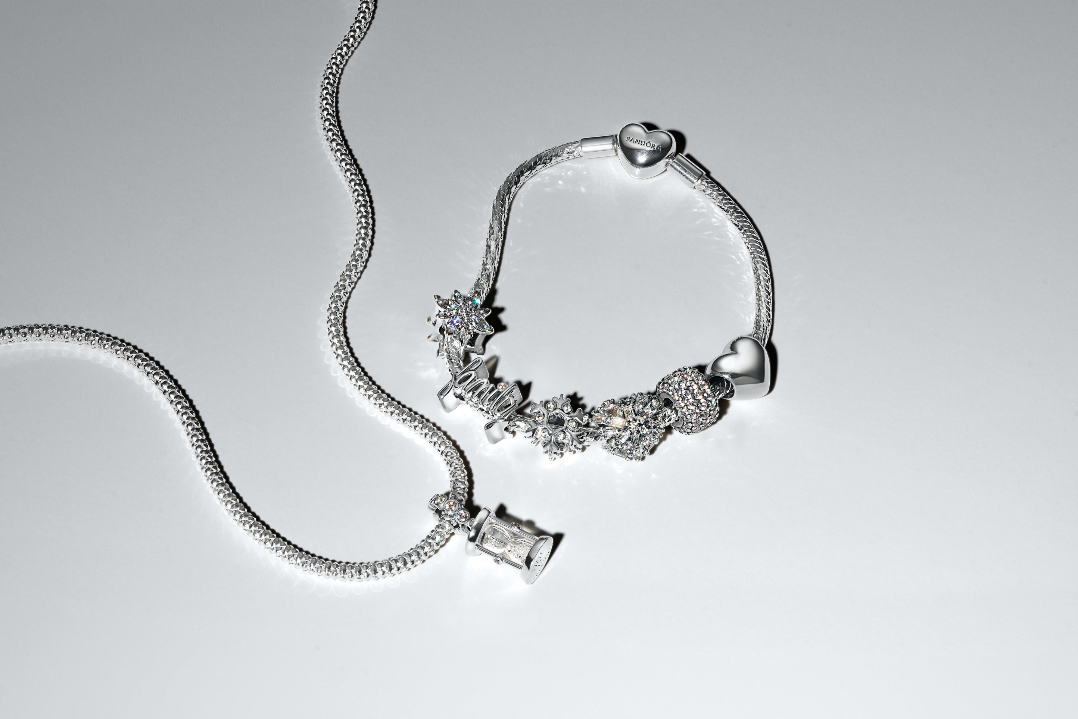 Hourglass Sterling Silver Dangle With Clear Cubic Zirconia And Glass