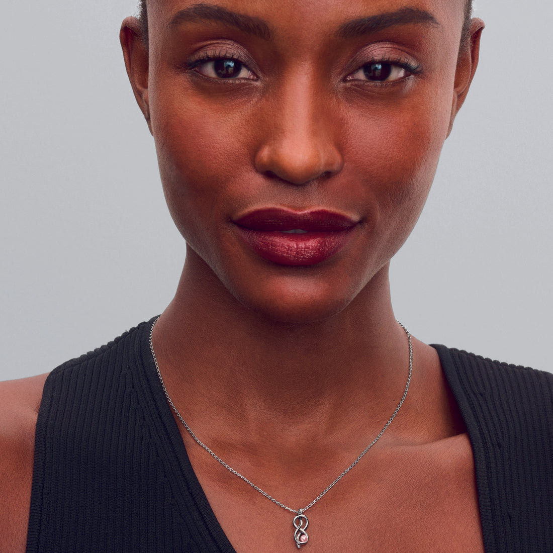 Infinity Knot Sterling Silver Pendant Necklace With Pink Lacquered Artificial Pearl And Clear Cubic Zirconia