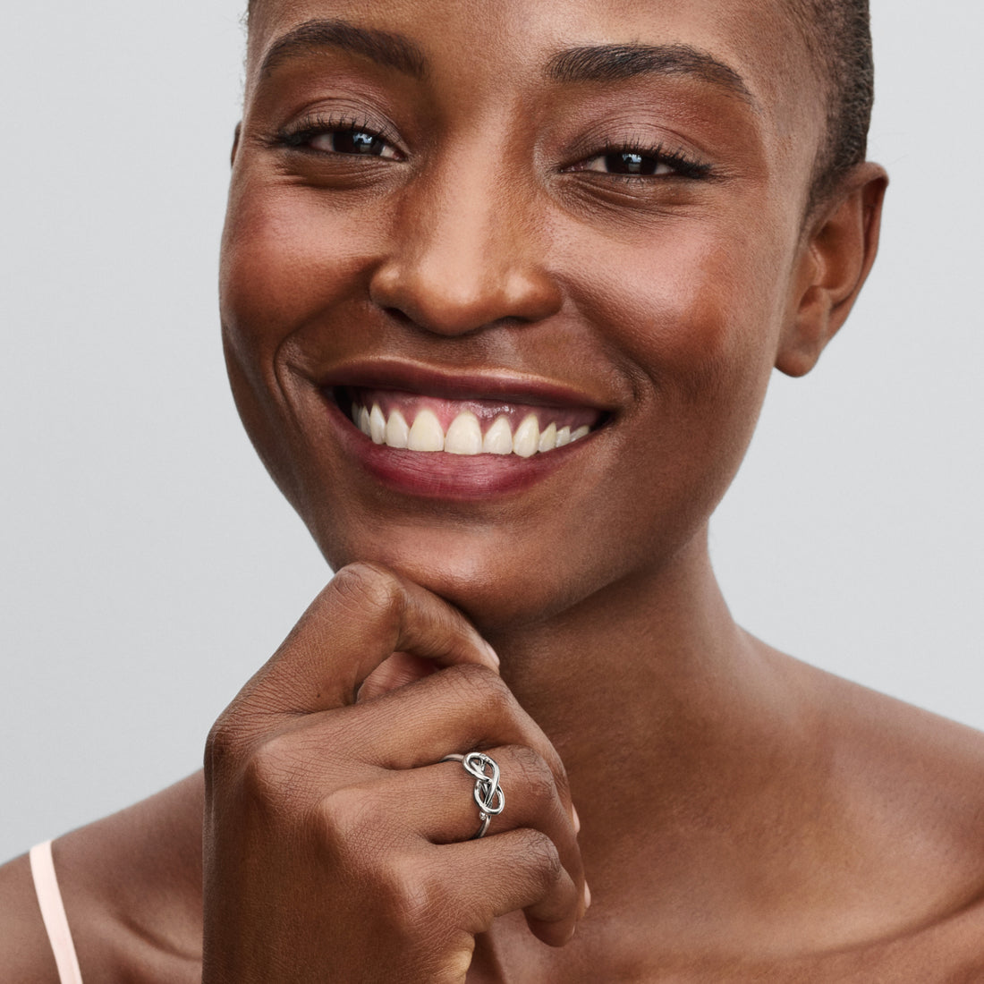 Infinity Knot Sterling Silver Ring With Clear Cubic Zirconia