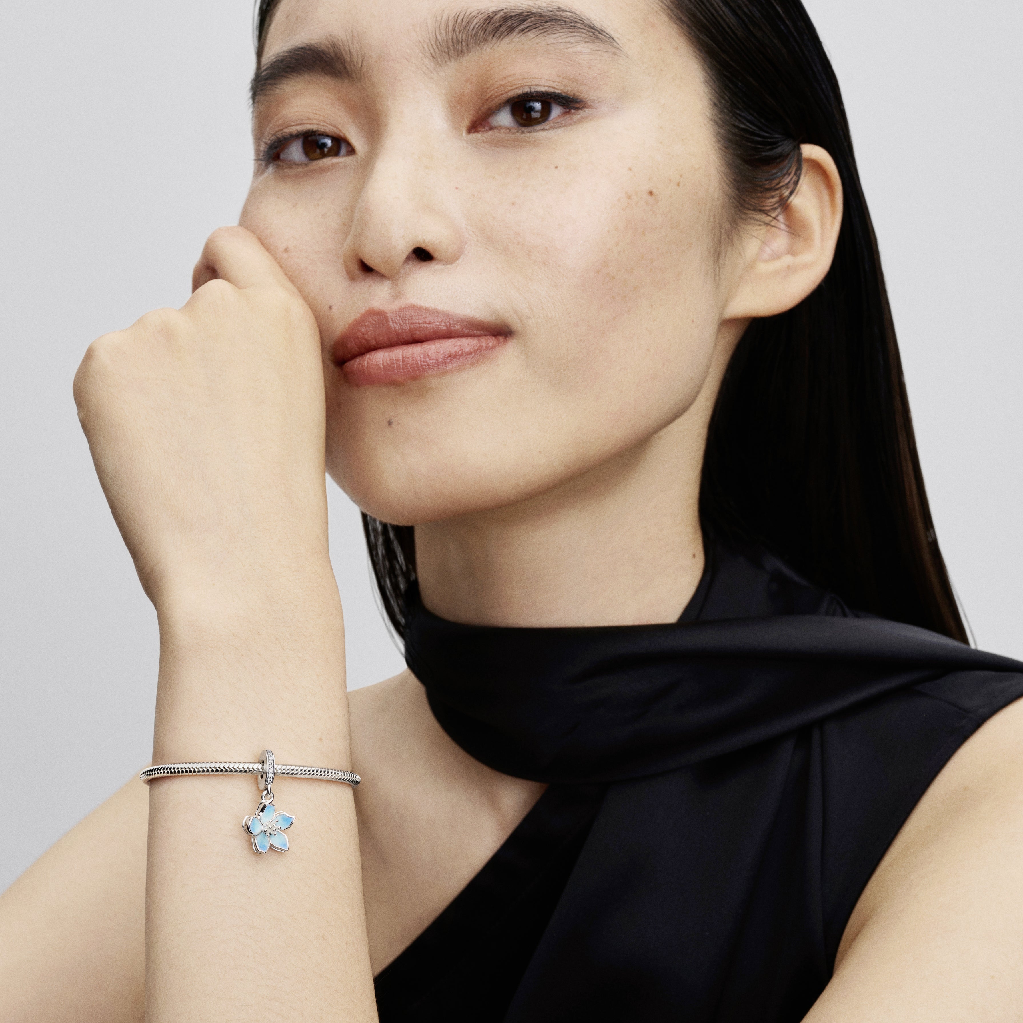 Movable Cherry Blossom Sterling Silver Dangle With Clear Cubic Zirconia And Shaded Blue Enamel