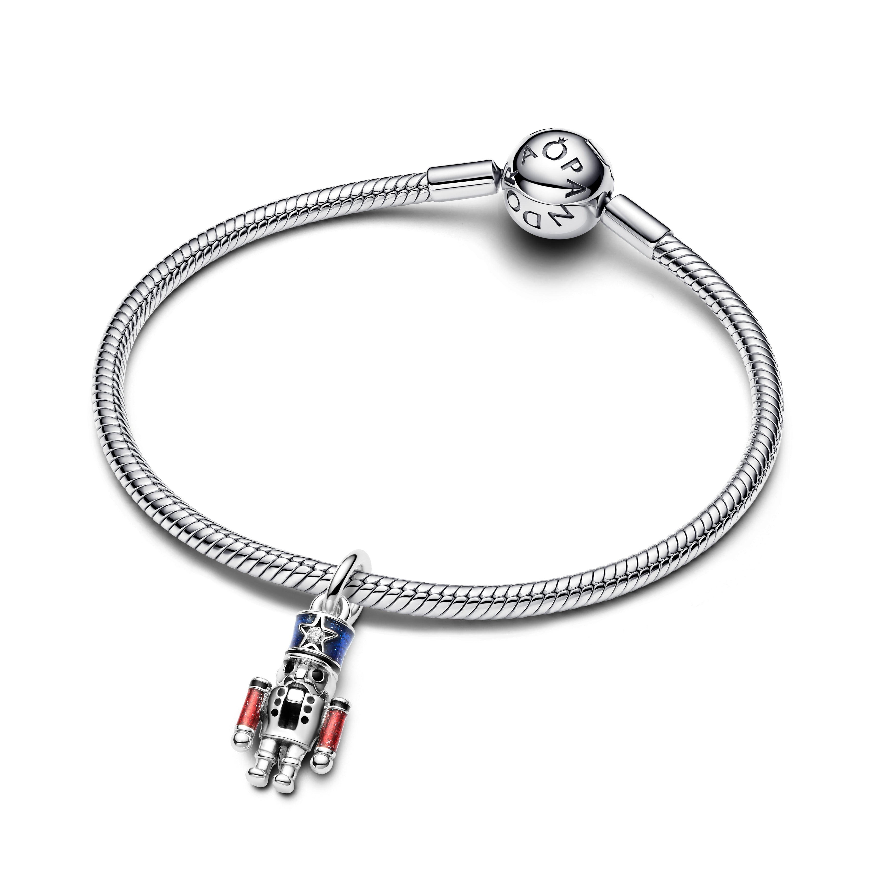 Moveable Nutcracker Sterling Silver Dangle With Clear Cubic Zirconia, Glittery Blue, Red And Black Enamel