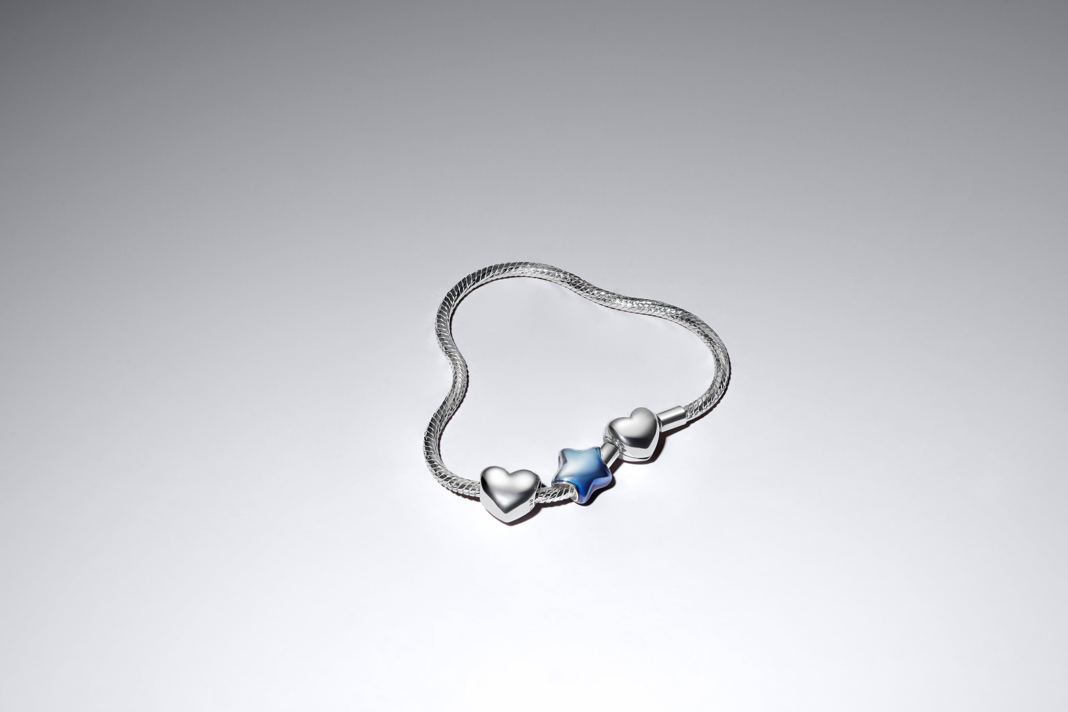 Puffy Star Sterling Silver Charm With Blue Enamel