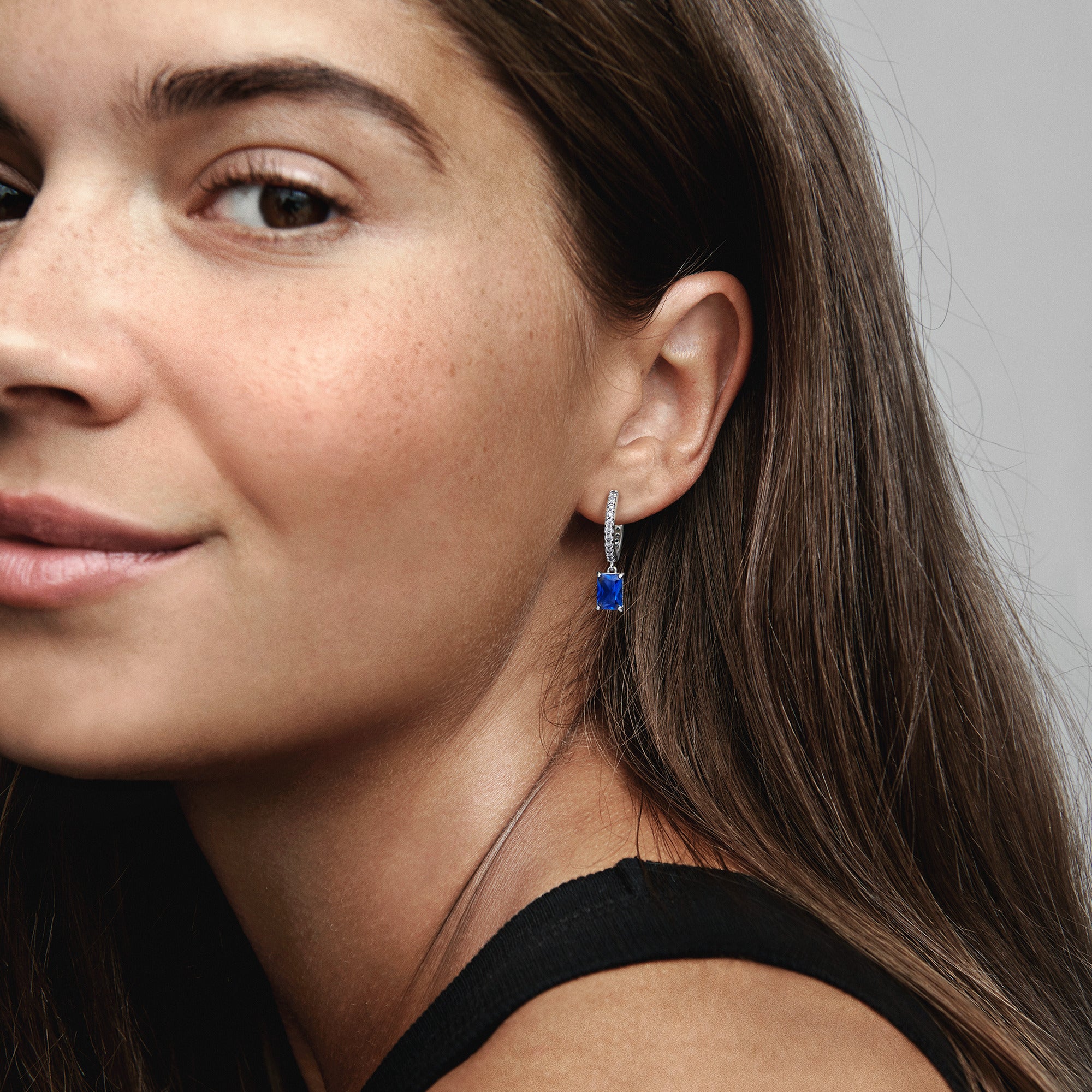 Sterling Silver Hoop Earrings With Princess Blue Crystal And Clear Cubic Zirconia