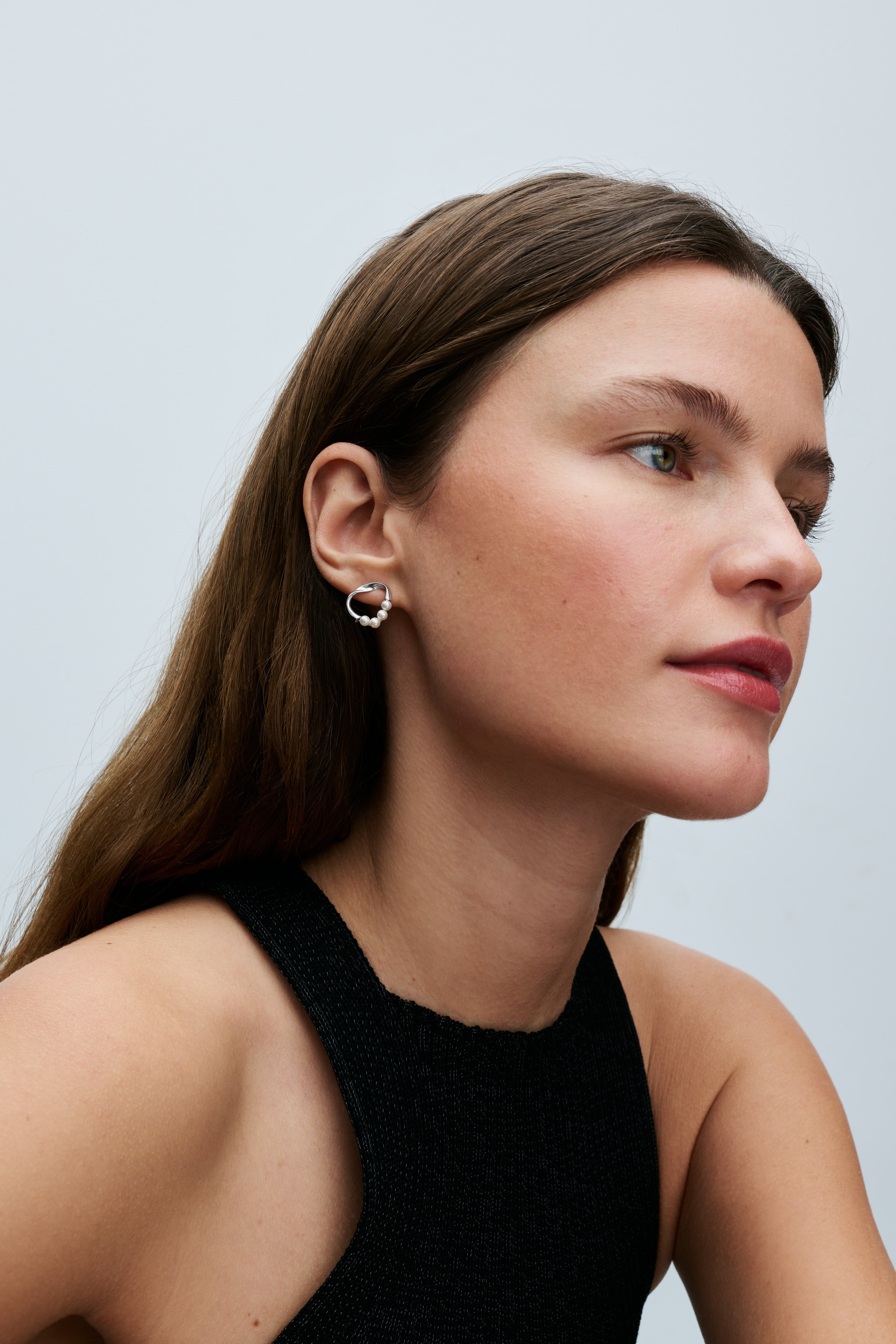 Sterling Silver Stud Earrings With White Treated Freshwater Cultured Pearl