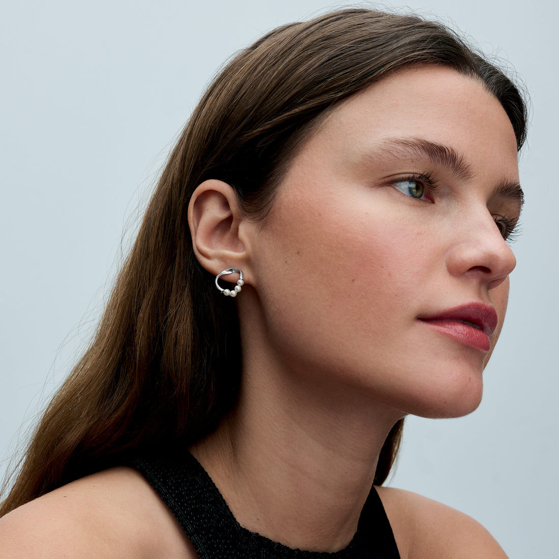 Sterling Silver Stud Earrings With White Treated Freshwater Cultured Pearl