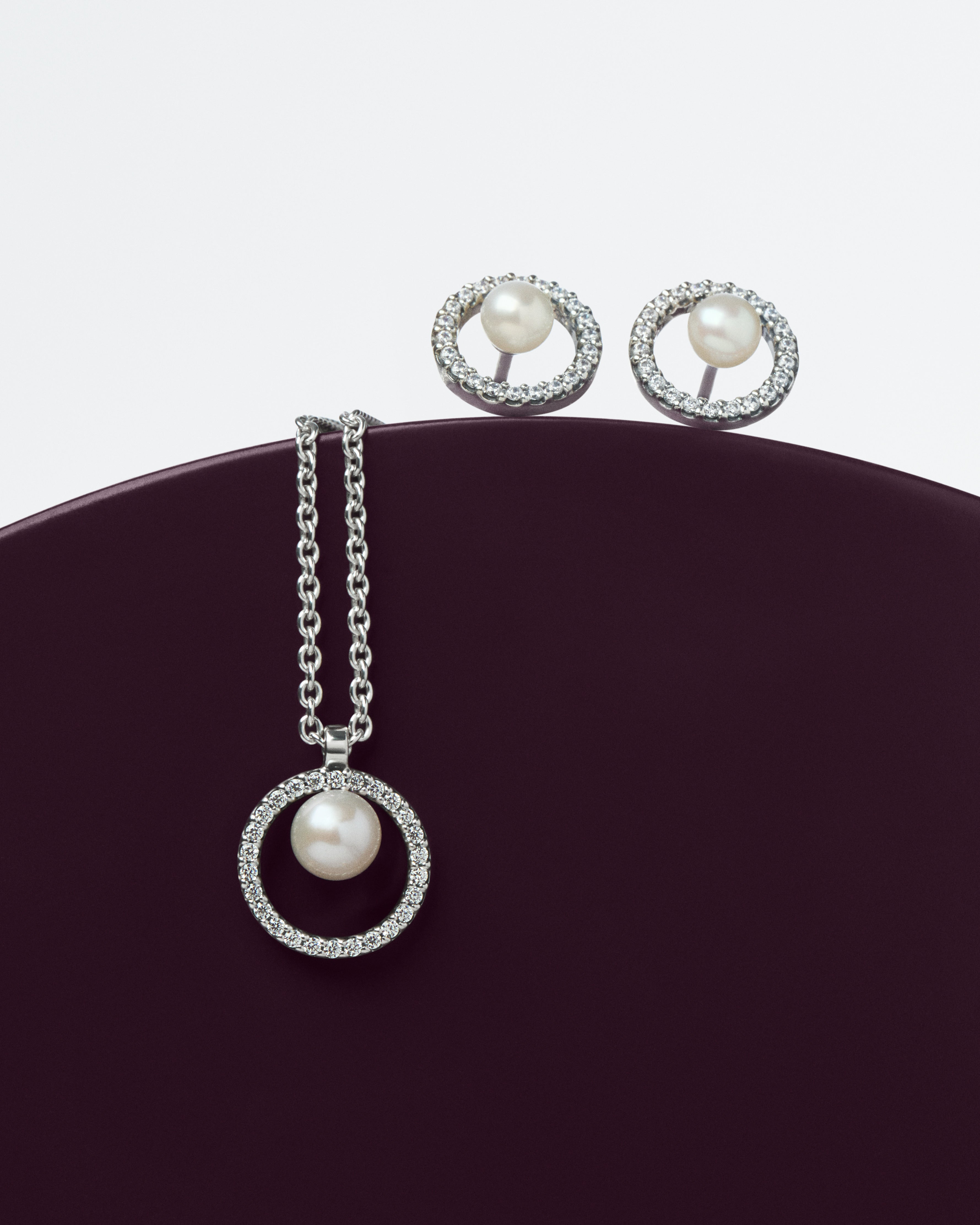 Sterling Silver Stud Earrings With White Treated Freshwater Cultured Pearl And Clear Cubic Zirconia