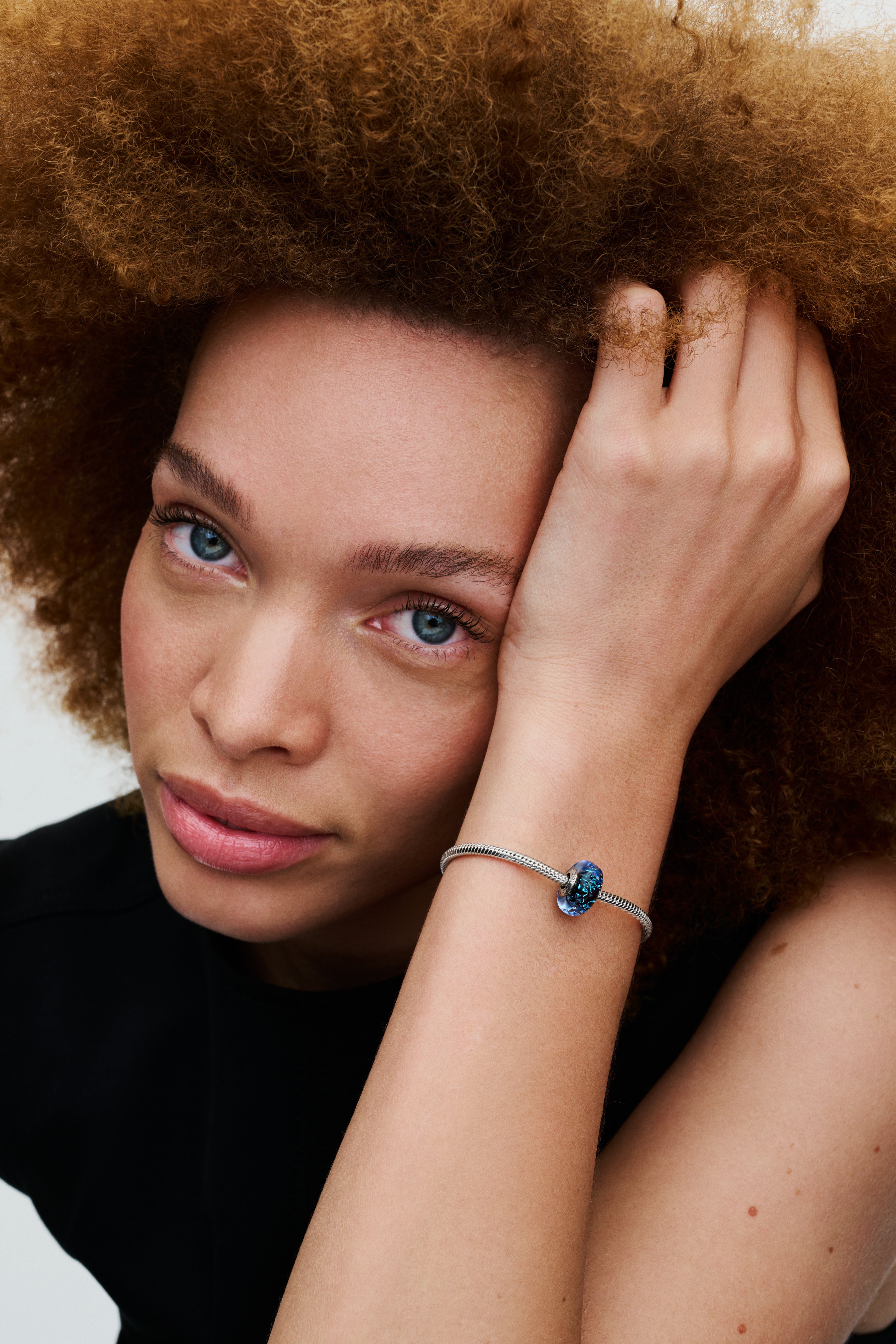 Wavy Sterling Silver Charm With Iridescent And Dark Blue Murano Glass